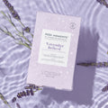 Pedi Moments Lavender Relieve on a water background with sprigs of lavender.
