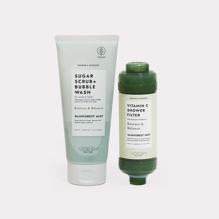 Rainforest Mist Shower & Empower Duo - Sugar scrub and shower filter on gray background