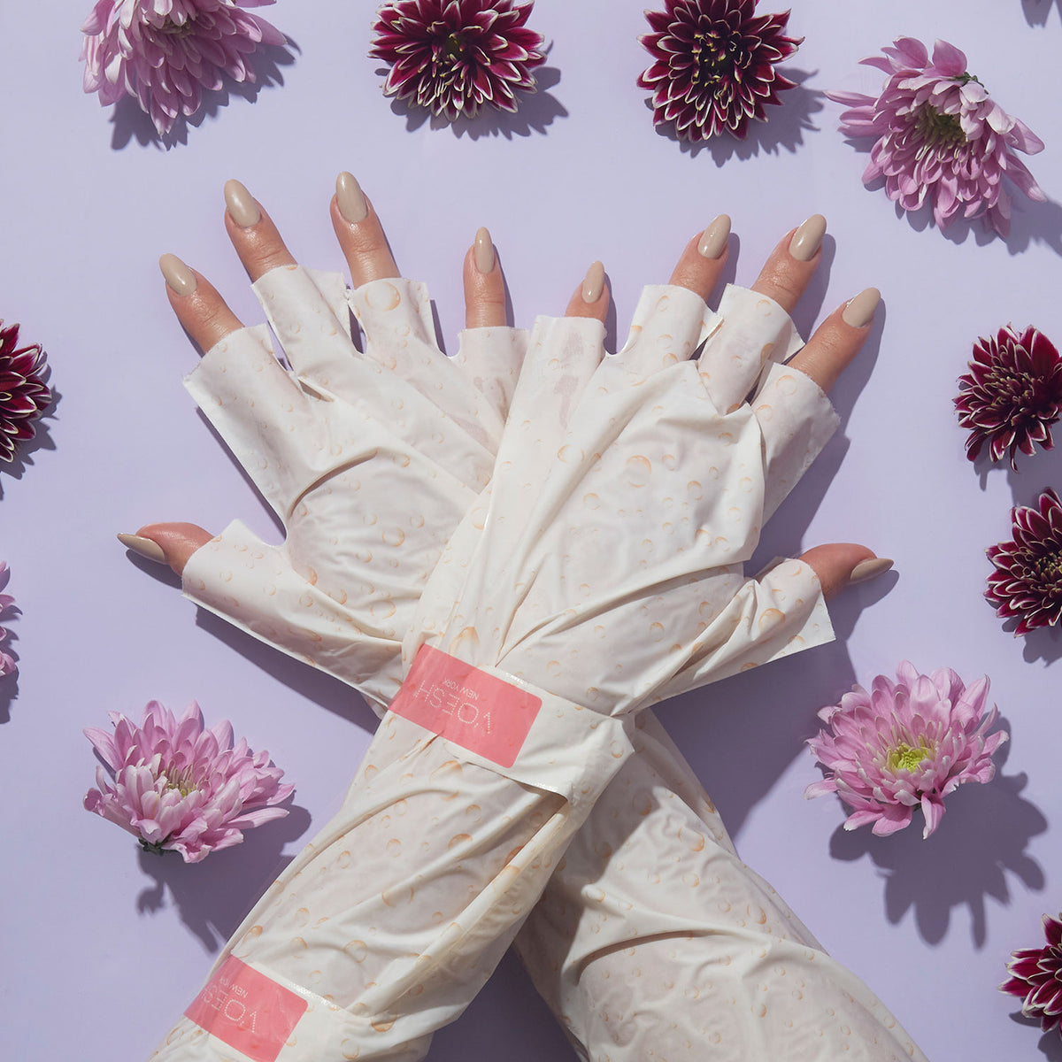 a Model's Hands with VOESH's Youth Therapy Elbow High Gloves