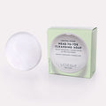 Crystal Clear Head-To-Toe Cleansing Soap and packaging on a gray background.