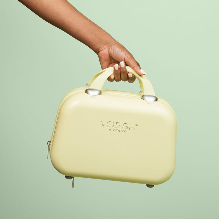 VOESH Carry-On Luggage small carrying case in models hand