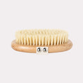 Side view of VOESH Dry Body Brush on a white background.