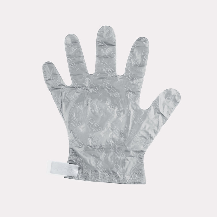 Collagen glove laying flat on grey background