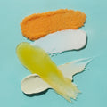 Texture swipes of each step of Pedi Moments Mango Delight on a blue background.