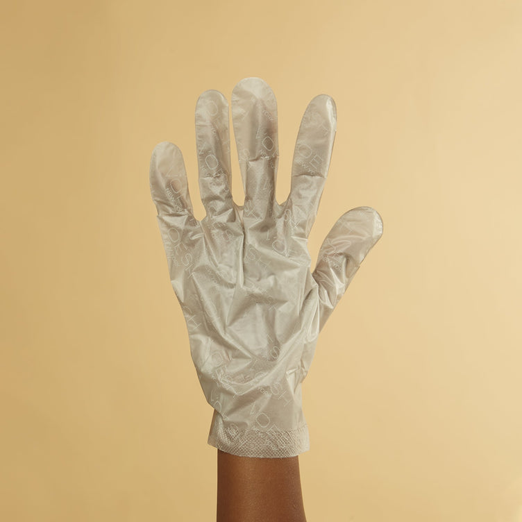 Woman wearing collagen gloves