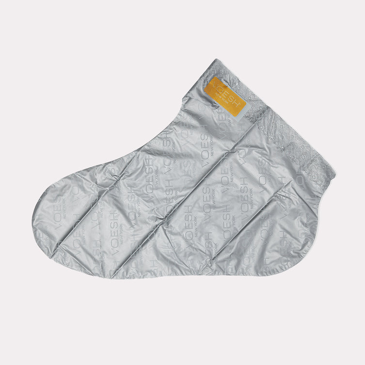 collagen socks laying flat on grey background