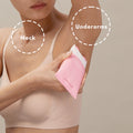 Woman in her bra and underwear using Smooth’d Body Refining Roller Crème on her underarm area, pictured on a tan background.Woman in her bra and underwear using Smooth’d Body Refining Roller Crème on her underarm area, pictured on a tan background.