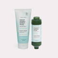 Clean Ocean Shower & Empower Duo - Sugar scrub and shower filter on gray background