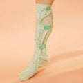 Woman wearing Cooling Therapy Knee High Socks