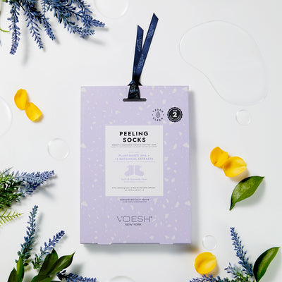 Voesh Peeling Socks Duo Packaging with lavender branches in the background