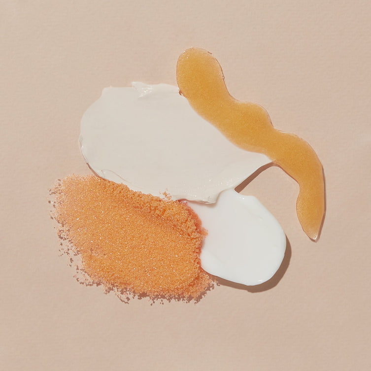 Product texture of Salt, Scrub Mud masque, Massage butter on orange background